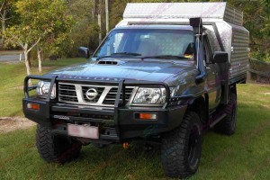 Front angle view of Nissan Patrol GU Ute fitted with a 3 Inch Profender Airbag Lift Kit