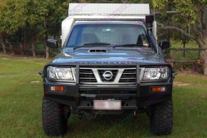 Front angle view of Nissan Patrol GU Ute fitted with a 3 Inch Profender Airbag Lift Kit