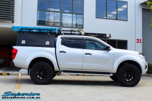 Right side view of a Grey Nissan NP300 Navara Ute after fitment of a Superior Nitro Gas 4" Inch Lift Kit + Airbag Man 2" Coil Air Kit Helper, Ironman 4x4 Flomax Air Compressor and Nitto Trail Grappler Tyres with King Gator Wheels
