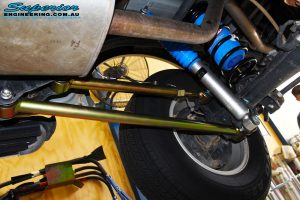 Right underbody view of the fitted Superior Nitro Gas Shock + Coil Spring with Airbag Man Coil Air Kit Helper and Lower & Upper Control Arms