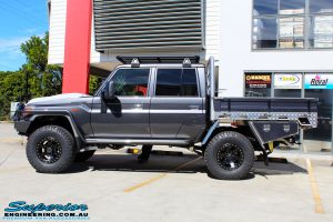 Left side view of a Grey Toyota 79 Series Landcruiser Dual Cab after fitment of a Superior 3" Inch Nitro Gas Lift Kit, Airbag Man Digital Dual Air Control Kit w/Tyre Inflation & Leaf 3" Inch Air Lift Kit