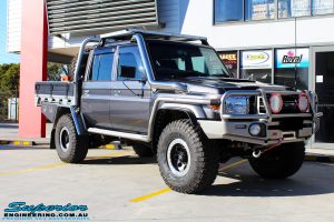 Right front side view of a Grey Toyota 79 Series Landcruiser Dual Cab before fitment of a range of Suspension Components and 4x4 Accessories