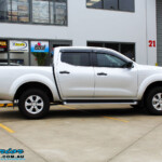 Right side view of a Grey Nissan NP300 Navara Ute before fitment of a Superior Nitro Gas 4" Inch Lift Kit + Airbag Man 2" Coil Air Kit Helper, Ironman 4x4 Flomax Air Compressor and Nitto Trail Grappler Tyres with King Gator Wheels