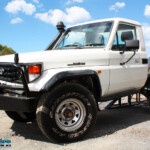 Left front side view of a Toyota Landcruiser 79 Series after fitting a Superior 2" Inch Rear Coil Conversion Kit