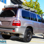 Rear right view of a Silver Toyota 100 Series Landcruiser before fitment of a 2" Inch Lift Kit with Airbags
