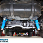 Mid rear outside view of the fitted Superior Sway Bar Kit, Extended Brake Lines, Remote Reservoir Shocks & Coil Springs