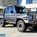 Right front side view of a Grey Toyota 79 Series Landcruiser Dual Cab before fitment of a range of Suspension Components and 4x4 Accessories