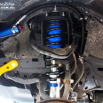 Front left inside guard view of the fitted Superior Remote Reservoir Strut & Coil Spring
