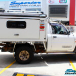 Right side view of a White Nissan GU Patrol after fitment of a range of Superior and various other brands suspension components